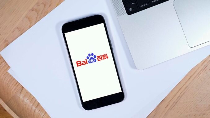 Baidu ERNIE X1 and 4.5 Turbo boast high performance at Baidu logo on a mobile smartphone as the China tech giant unveils ERNIE X1 Turbo and 4.5 Turbo, two fast models that boast impressive performance in benchmarks alongside dramatic cost reductions.