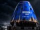 Blue space capsule marked Mission 1 2022, accompanying AX1 Console 2.0's agentic activities launchpad.